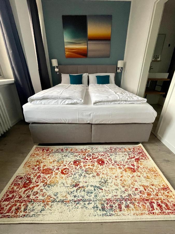 Aparthotel Neumuenster City Bagian luar foto